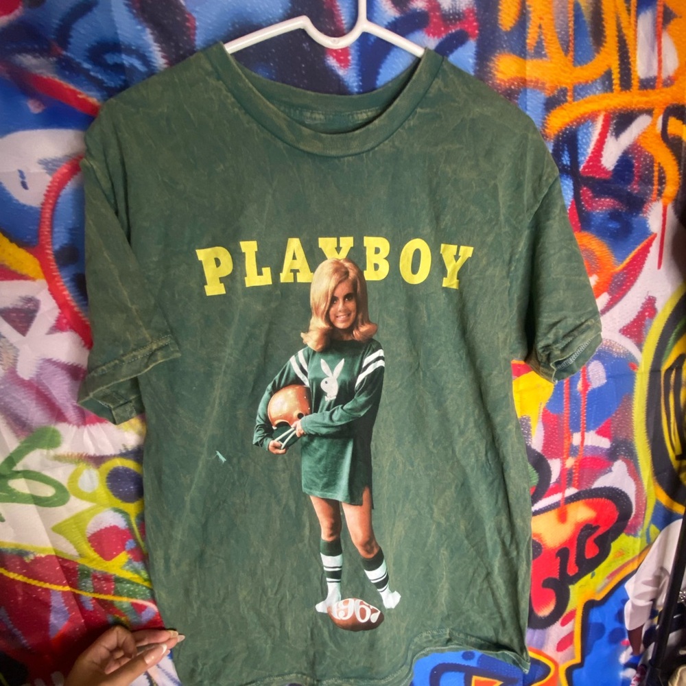 Playboy T shirt size L one call out on the shit a small stain